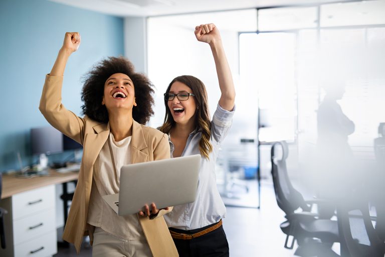 women leaders celebrating