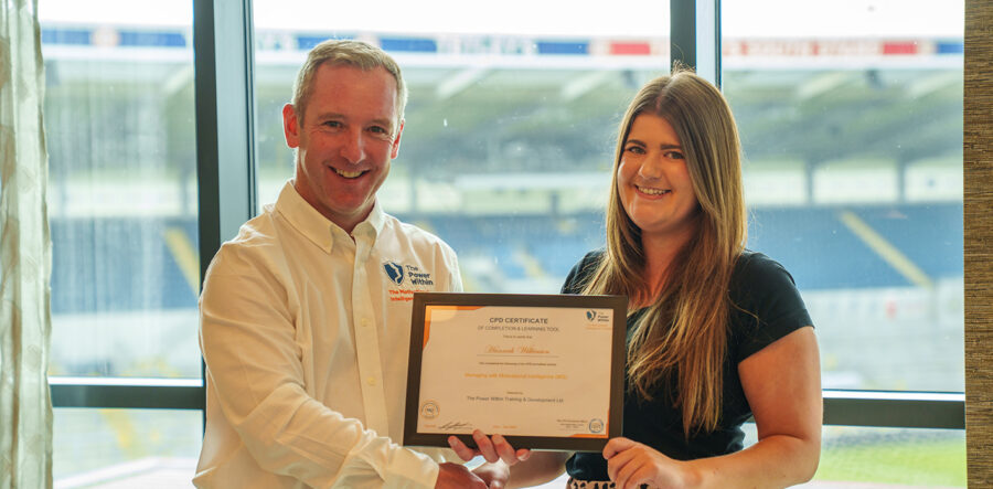 Participant receiving his CITB-approved Managing with Motivational Intelligence certificate alongside Alan.